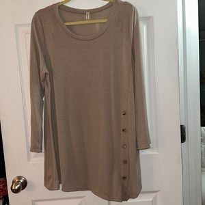 Boutique tunic top. Taupe asymmetrical hemline. Button detail on left front.